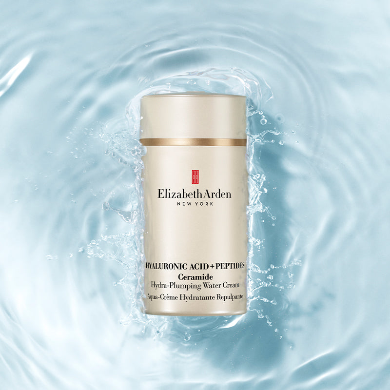 Hyaluronic Acid + Peptides Ceramide Hydra-Plumping Water Cream with water droplets on a light blue background