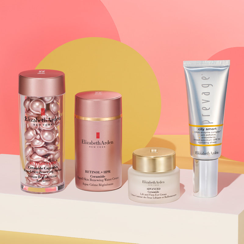 skincare products on pink background