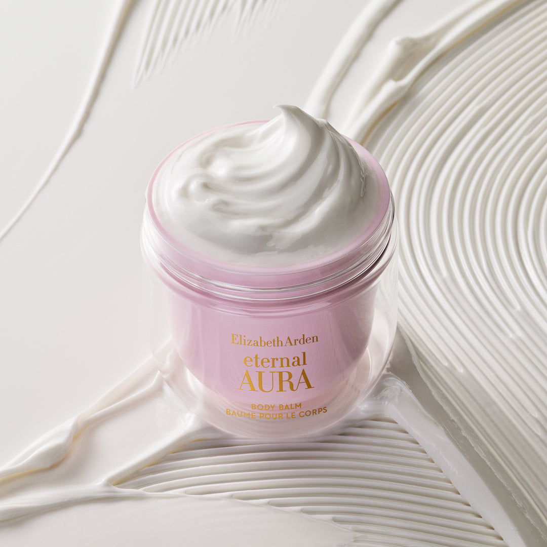 Open jar of Eternal Aura Body Balm with whipped moisturising cream texture