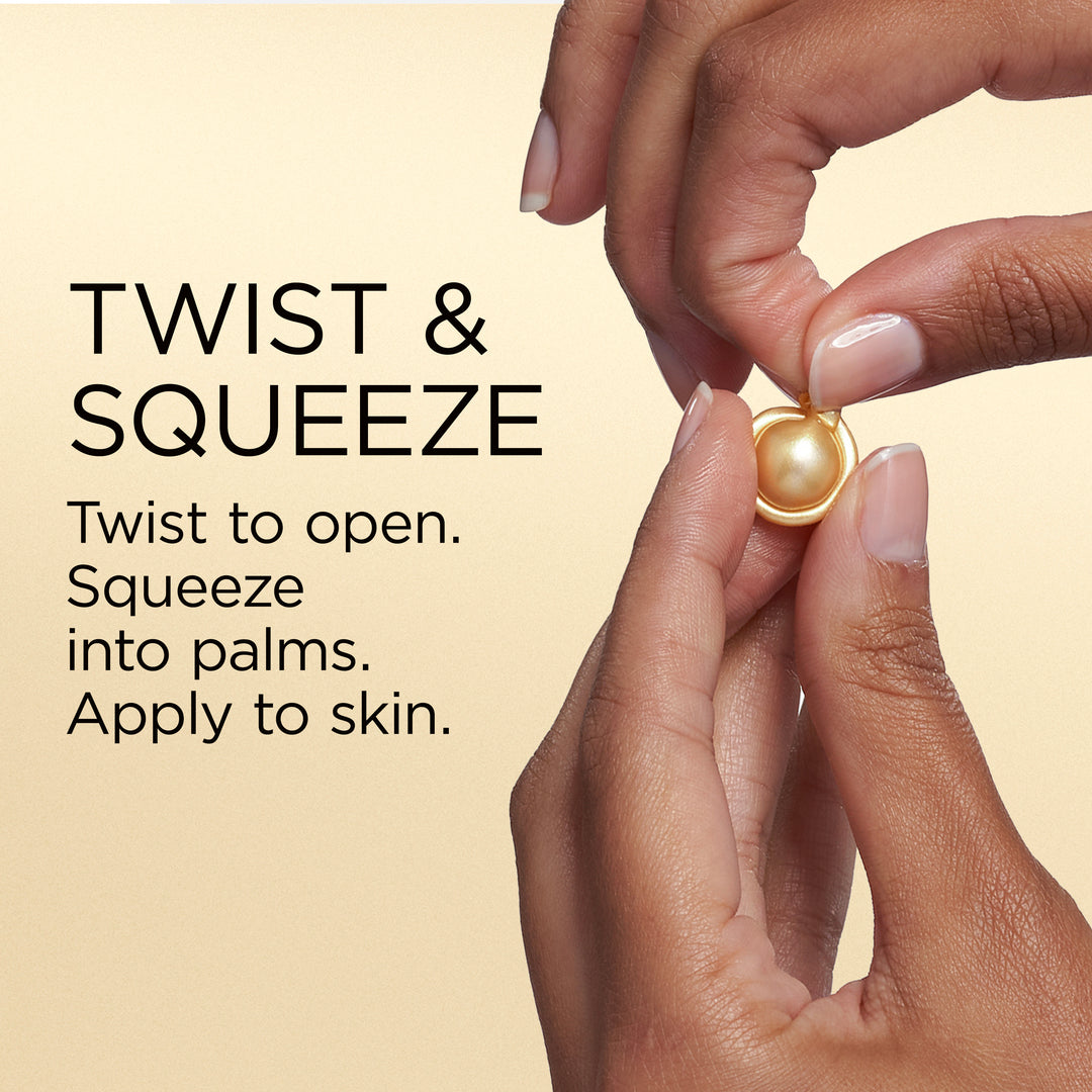 Close-up of hands demonstrating a gold ring with a pearl-like center, with text reading 'TWIST & SQUEEZE' and instructions on how to open and apply the ring.
