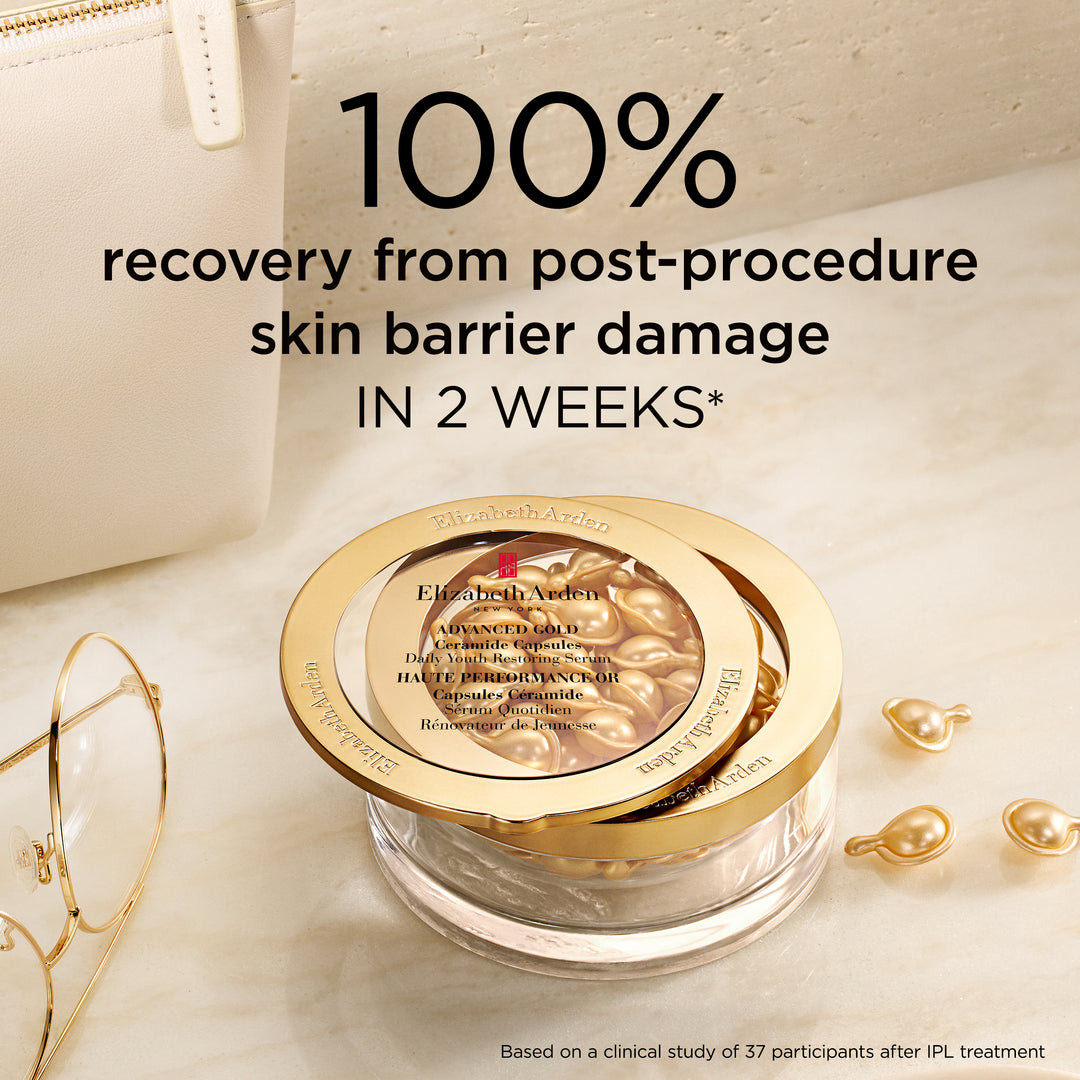 Elizabeth Arman Advanced Cell Therapy hair restoration gel in a clear jar with a gold lid, styled on a marble surface with gold capsules, glasses, and a white bag. Large text reads '100% recovery from post-procedure skin barrier damage IN 2 WEEKS*'.