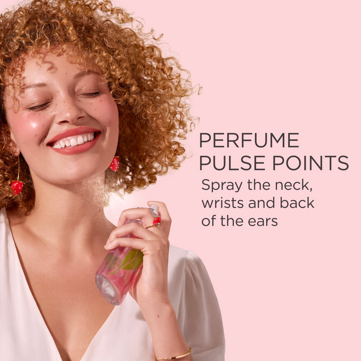 Woman spraying Green Tea Strawberry Basil Eau De Toilette on neck pulse point