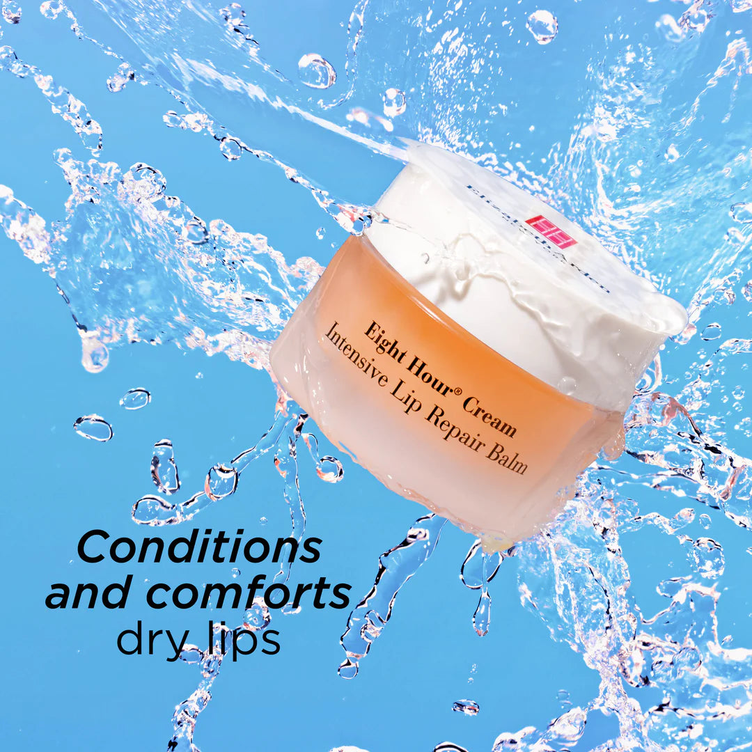 A jar of Eight Hour Cream Intensive Lip Repair Balm floating in a water splash against a bright blue background, with the text 'Conditions and comforts dry lips' in the lower left.