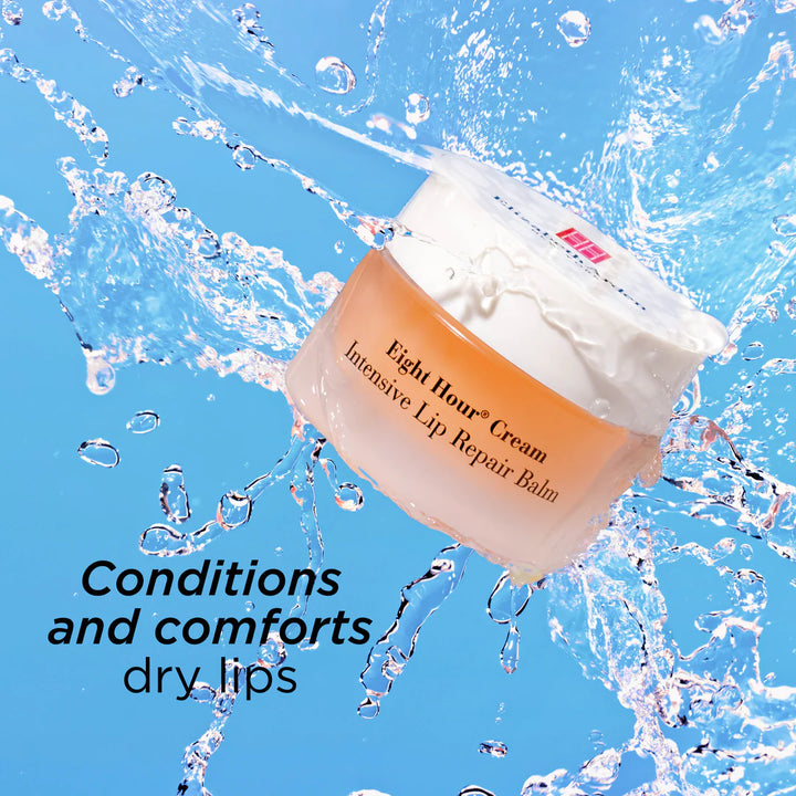 A jar of Eight Hour Cream Intensive Lip Repair Balm floating in a water splash against a bright blue background, with the text 'Conditions and comforts dry lips' in the lower left.