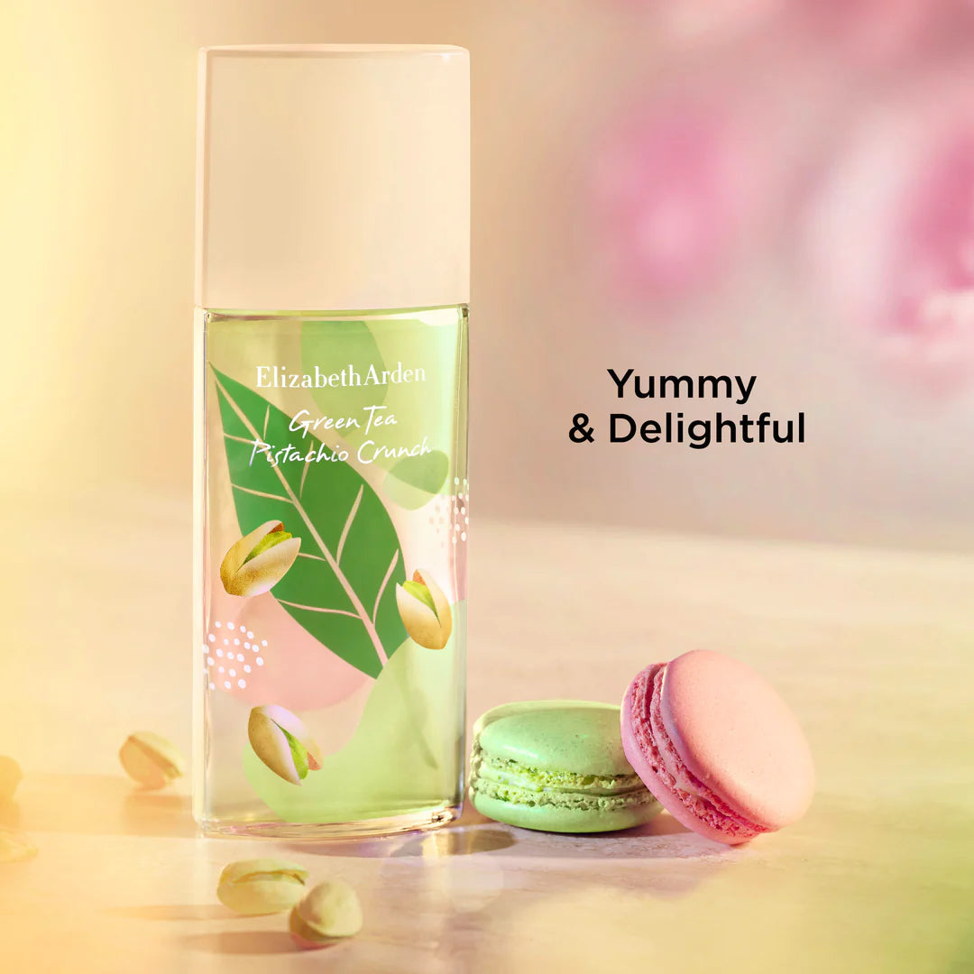 Elizabeth Arden perfume bottle with macarons on a soft background