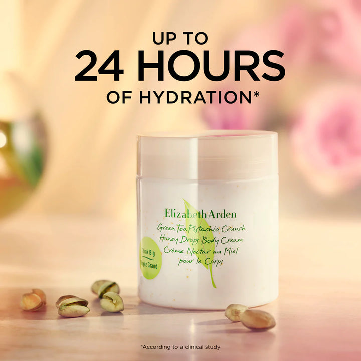 Elizabeth Arden Green Tea Pistachio Crunch Honey Dew Body Cream jar on a wooden surface with pistachios, featuring a large text overlay that reads 'UP TO 24 HOURS OF HYDRATION'.