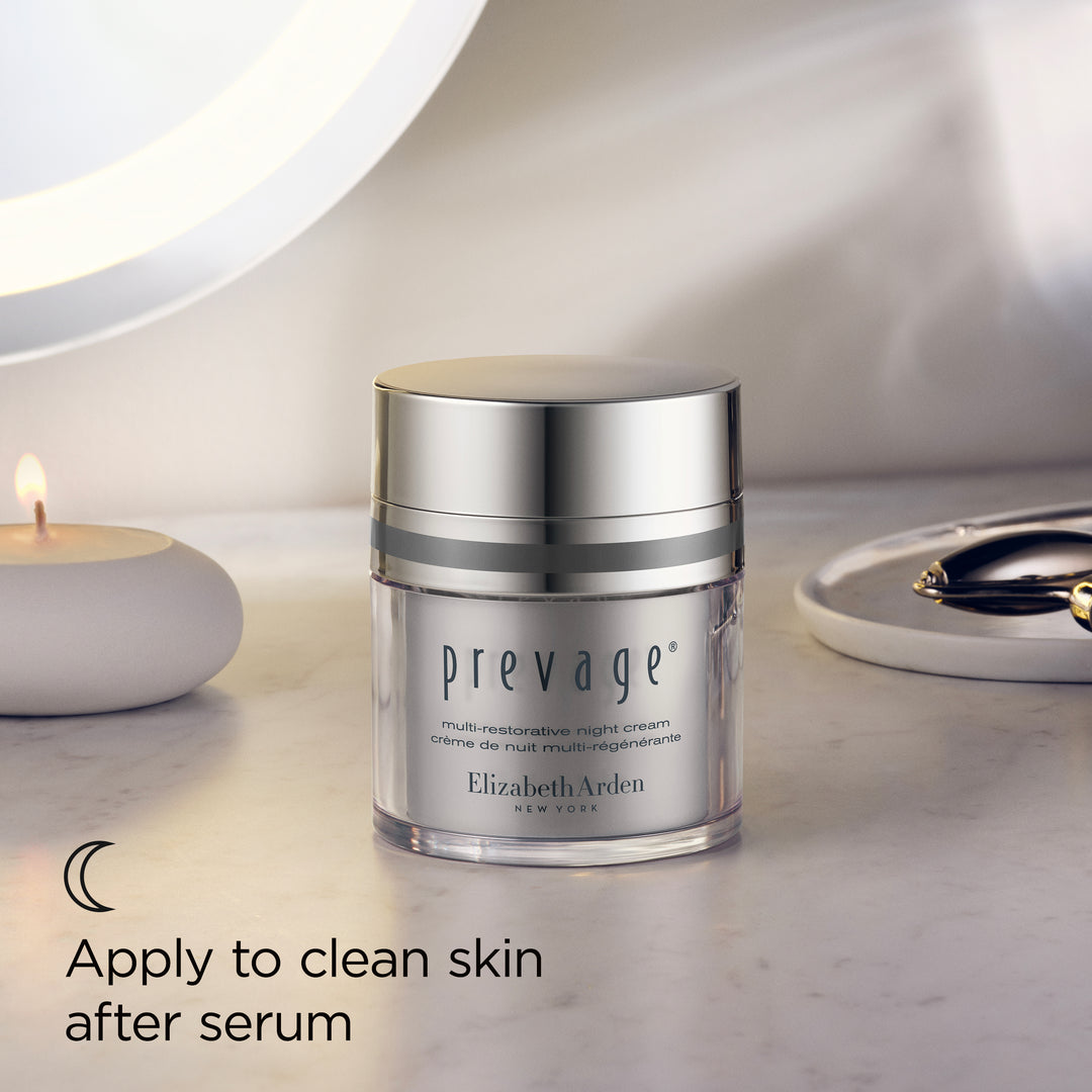 Prevage skincare product by Elizabeth Arden on a marble surface with soft lighting