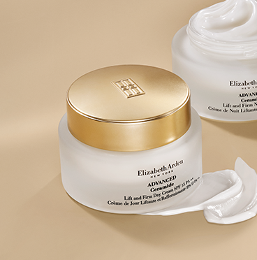 ELIZABETH arden advanced ceramide cream with gold lid on a cream background